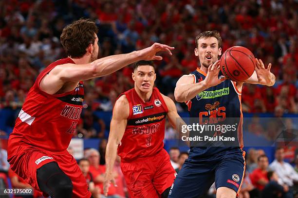 Mitch McCarron of the Taipans passe sthe ball during the round 16 NBL match between the Perth Wildcats and the Cairns Taipans at Perth Arena on...