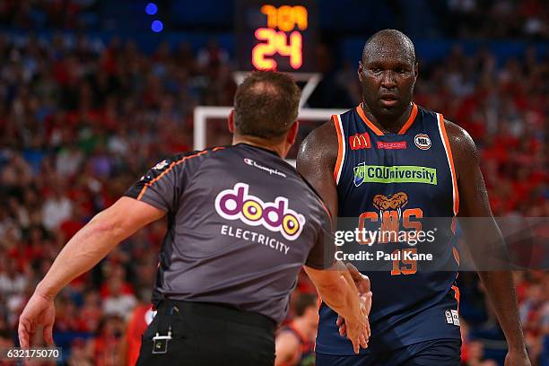 Referee Michael Aylen acknowledges Nathan Jawai of the Taipans during the round 16 NBL match between the Perth Wildcats and the Cairns Taipans at...