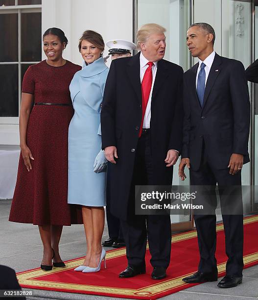 President-elect Donald Trump ,and his wife Melania Trump , are greeted by President Barack Obama and his wife first lady Michelle Obama, upon...