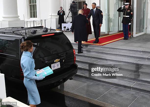 President-elect Donald Trump ,and his wife Melania Trump , are greeted by President Barack Obama , and his wife first lady Michelle Obama, upon...