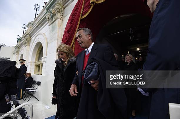 Former Speaker of the House John Boehner and his wife Debbie arrive for the Presidential Inauguration of Donald Trump at the US Capitol in...