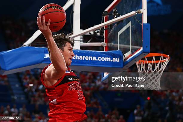 Damian Martin of the Wildcats keeps the ball in play during the round 16 NBL match between the Perth Wildcats and the Cairns Taipans at Perth Arena...