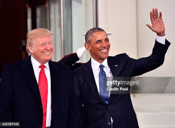 President Barak Obama and President-elect Donald Trump smile at the White House before the inauguration on January 20, 2017 in Washington, D.C. Trump...