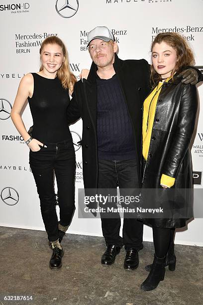 Ben Becker, his daughter Lilith Maria Doerthe Becker and guest attend the Dawid Tomaszewski X Patrizia Aryton show during the Mercedes-Benz Fashion...