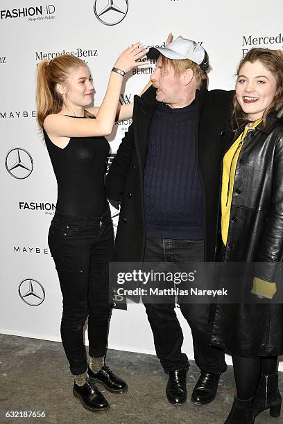 Ben Becker, his daughter Lilith Maria Doerthe Becker and guest attend the Dawid Tomaszewski X Patrizia Aryton show during the Mercedes-Benz Fashion...