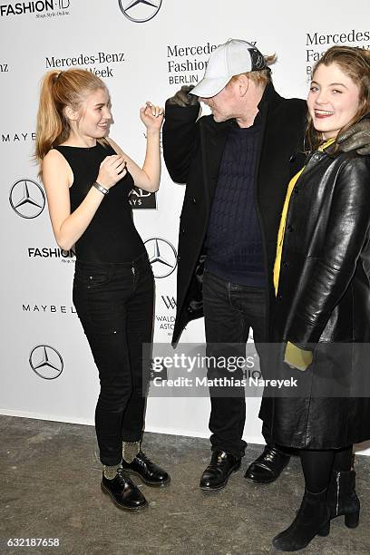 Ben Becker, his daughter Lilith Maria Doerthe Becker and guest attend the Dawid Tomaszewski X Patrizia Aryton show during the Mercedes-Benz Fashion...