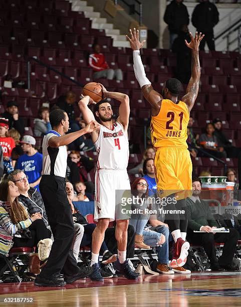 Abdel Nader of the Maine Red Claws inbounds the ball while Roosevelt Jones of the Canton Charge plays defense as part of 2017 NBA D-League Showcase...