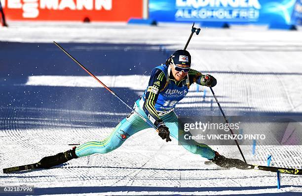 Sergey Semenov of Ukraine crashes as he crosses the finish line of the Biathlon World Cup Men's 20km individual race in Anterselva on January 20,...