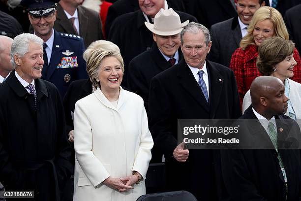 Former President Bill Clinton , former Democratic presidential nominee Hillary Clinton and former President George W. Bush stand on the West Front of...