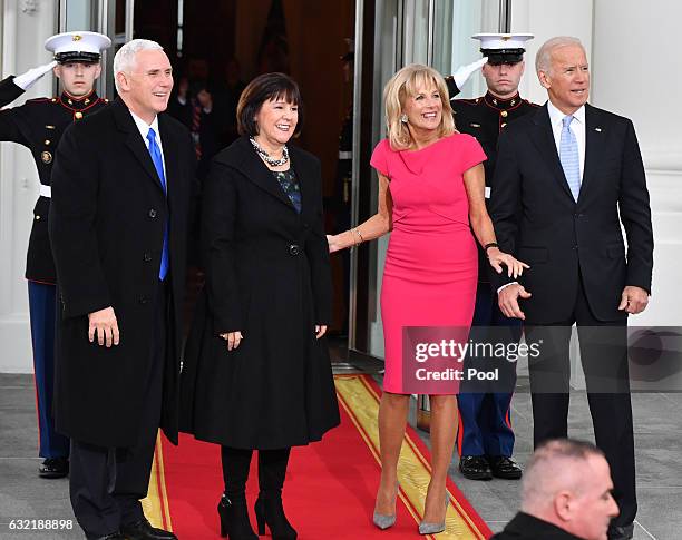 Vice President Joe Biden and Dr. Jill Biden pose with Vice President-elect Mike Pence and wife Karen Pence at the White House before the inauguration...