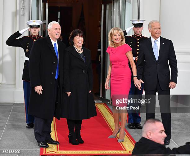 Vice President Joe Biden and Dr. Jill Biden pose with Vice President-elect Mike Pence and wife Karen Pence at the White House before the inauguration...