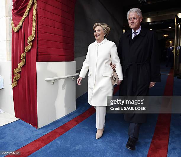 Former US President Bill Clinton and First Lady Hillary Clinton arrive for the Presidential Inauguration of Donald Trump at the US Capitol in...