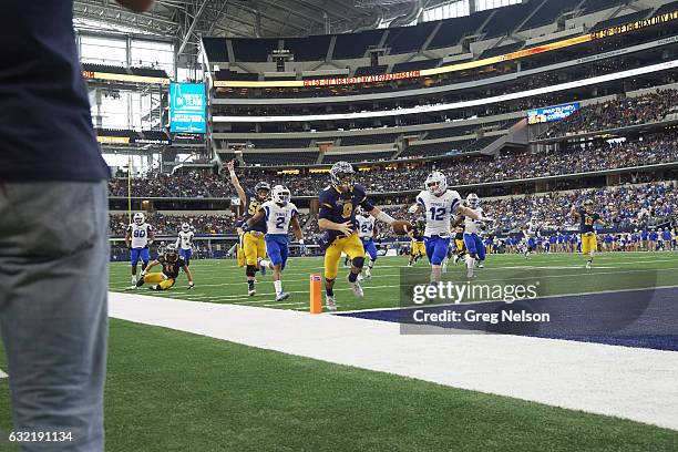 Texas State Championship: Highland Park HS QB John Stephen Jones in action, rushing for touchdown vs Temple HS at AT&T Stadium. Jones is the son of...