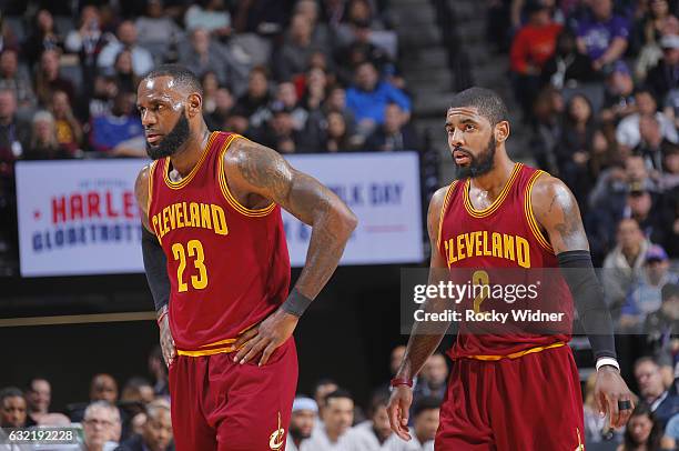 LeBron James and Kyrie Irving of the Cleveland Cavaliers look on during the game against the Sacramento Kings on January 13, 2017 at Golden 1 Center...