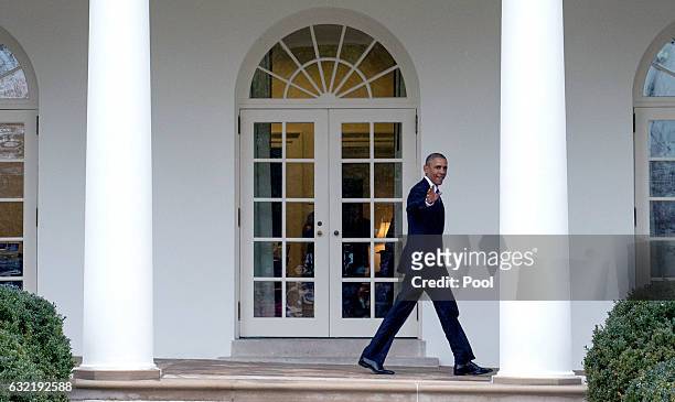 President Barack Obama walks on the colonnade after leaving the Oval Office for the last time as President, in Washington, D.C. On January 20, 2017....