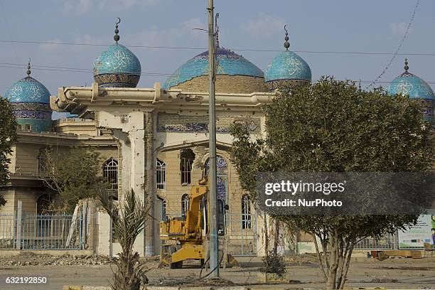 The bullet and shrapnel riddled of minarets of a mosque is seen in the city of Fallujah on January 19 50 kms west of Baghdad.