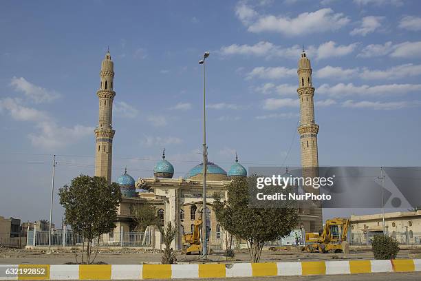 The bullet and shrapnel riddled of minarets of a mosque is seen in the city of Fallujah on January 19 50 kms west of Baghdad.