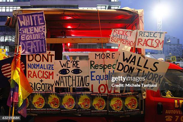 Van parked in front of the Headquarters of the far right party AFD or Alternative fuel Deutschland, is covered with placard reading anti Trump...