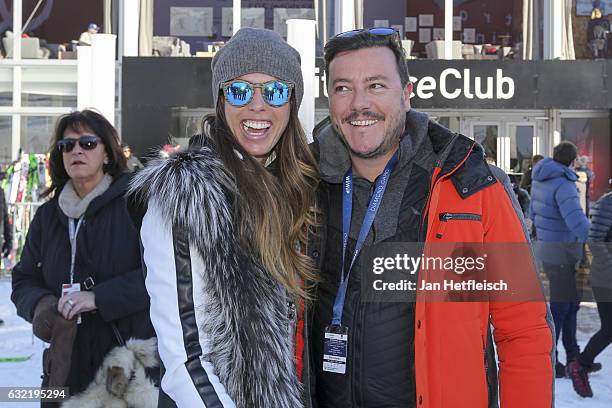 Austrian real estate tycoon Rene Benko and his wife Nathalie Benko poses for a picture during the Super G run on January 20, 2017 in Kitzbuehel,...