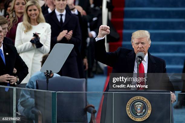 President Donald Trump raises a fist after his inauguration on the West Front of the U.S. Capitol on January 20, 2017 in Washington, DC. In today's...