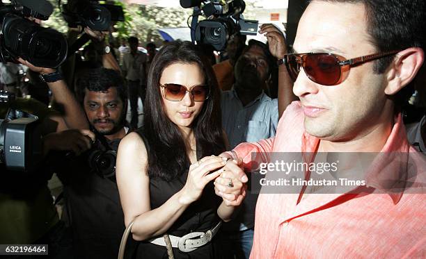 Team Mohali's owner Priety Zinta and Ness Wadia arrives for a meeting with IPL franchise owners in Mumbai at BCCI on Sunday.