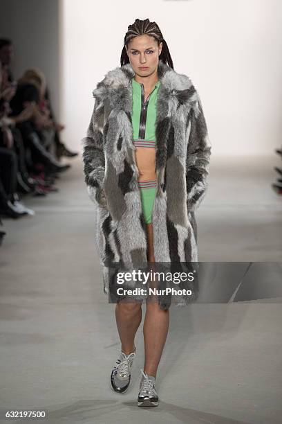 Marie Lang runs the runway at the Riani show during the Mercedes-Benz Fashion Week Berlin A/W 2017 at Kaufhaus Jandorf in Berlin, Germany on January...