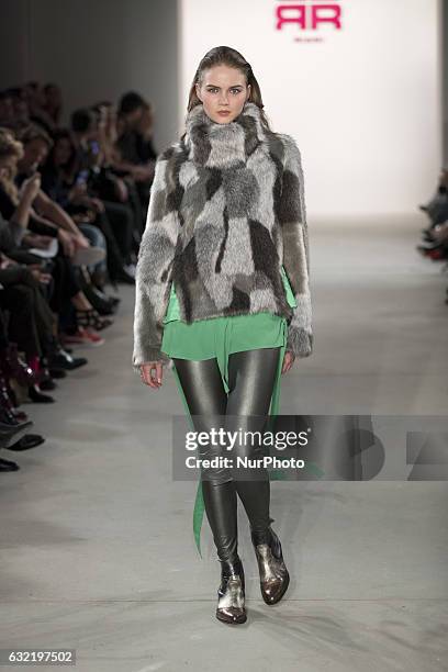 Model runs the runway at the Riani show during the Mercedes-Benz Fashion Week Berlin A/W 2017 at Kaufhaus Jandorf in Berlin, Germany on January 17,...