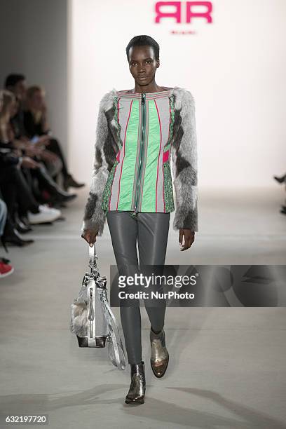 Model runs the runway at the Riani show during the Mercedes-Benz Fashion Week Berlin A/W 2017 at Kaufhaus Jandorf in Berlin, Germany on January 17,...