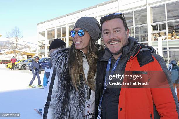 Austrian real estate tycoon Rene Benko and his wife Nathalie Benko poses for a picture during the Super G run on January 20, 2017 in Kitzbuehel,...