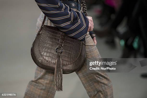 Model runs the runway at the Riani show during the Mercedes-Benz Fashion Week Berlin A/W 2017 at Kaufhaus Jandorf in Berlin, Germany on January 17,...