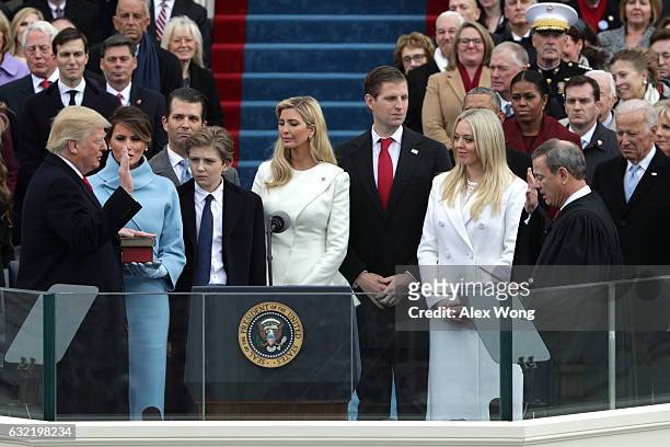 President Donald Trump takes the oath of office from Supreme Court Chief Justice John Roberts on the West Front of the U.S. Capitol on January 20,...