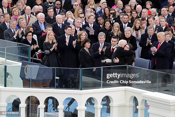 Vice President Mike Pence hugs his daughter Audrey Pence after he took the oath of office on the West Front of the U.S. Capitol on January 20, 2017...