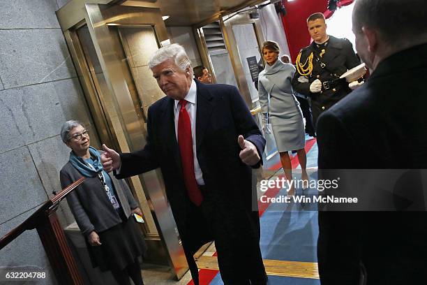 President Donald Trump leaves after being sworn in followed by first lady Melania Trump on the West Front of the U.S. Capitol on January 20, 2017 in...