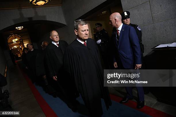 Supreme Court Chief Justice John Roberts and Anthony Kennedy arrive on the West Front of the U.S. Capitol on January 20, 2017 in Washington, DC. In...