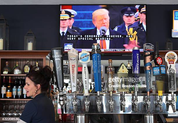 At 308 Lakeside Restaurant and Bar in East Brookfield, Mass., bartender Tammy Wonderlie stands behind the bar where she and customers and watched US...
