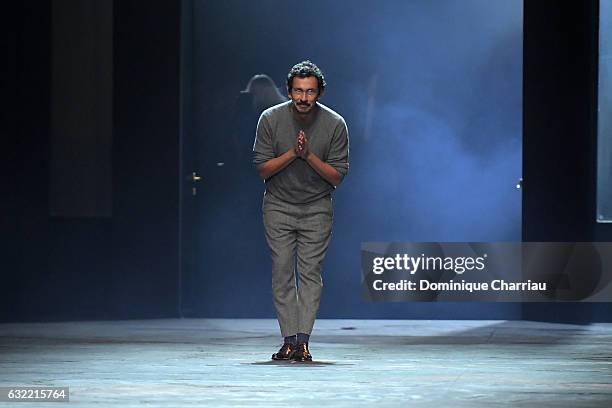 Designer Haider Ackermann walks the runway during the Berluti Menswear Fall/Winter 2017-2018 show as part of Paris Fashion Week on January 20, 2017...