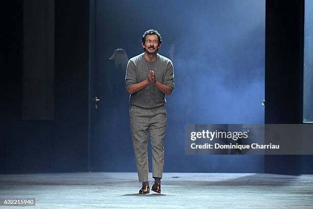 Designer Haider Ackermann walks the runway during the Berluti Menswear Fall/Winter 2017-2018 show as part of Paris Fashion Week on January 20, 2017...