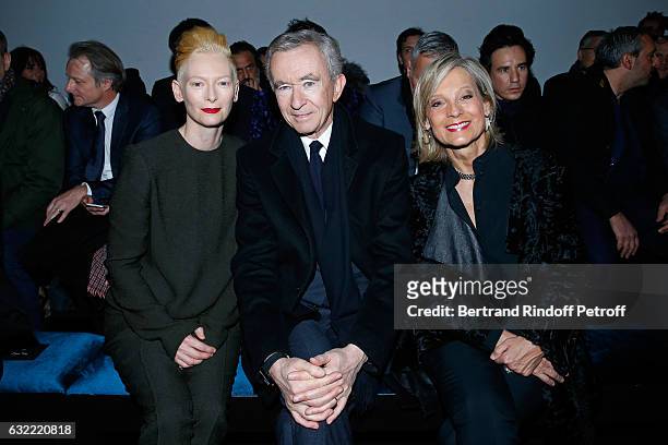 Tilda Swinton, Owner of LVMH Luxury Group Bernard Arnault and his wife Helene Arnault attend the Berluti Menswear Fall/Winter 2017-2018 show as part...