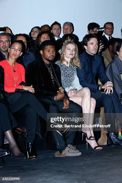 Singer Usher, his wife Grace Miguel, Natalia Vodianova and General manager of Berluti Antoine Arnault attend the Berluti Menswear Fall/Winter...