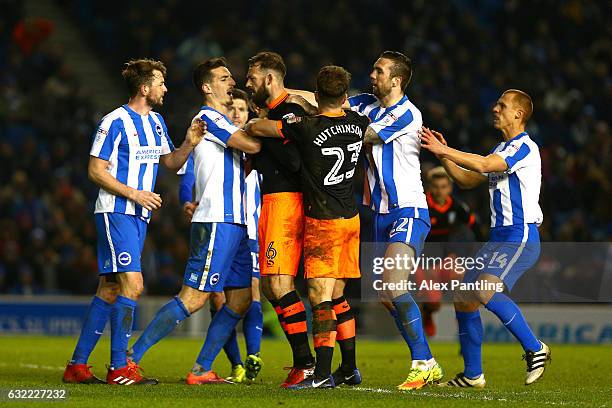 Steven Fletcher of Sheffield Wednesday argues with Brighton players leaidng to a red card during the Sky Bet Championship match between Brighton &...