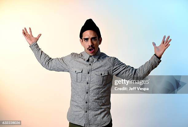 Actor Ray Santiago from the series "Ash vs Evil Dead" poses for a portrait in the WireImage Portrait Studio presented by DIRECTV during the 2017...