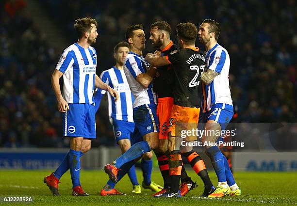 Steven Fletcher of Sheffield Wednesday argues with Brighton players leaidng to a red card during the Sky Bet Championship match between Brighton &...