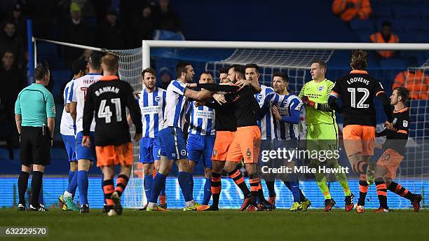 Shane Duffy of Brighton squares up to Steven Fletcher of Sheffield Wednesday during the Sky Bet Championship match between Brighton & Hove Albion and...