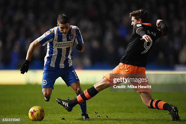 Anthony Knockaert of Brighton gets past Adam Reach of Sheffield Wednesday during the Sky Bet Championship match between Brighton & Hove Albion and...