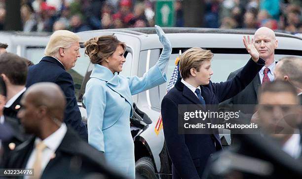 President Donald Trump, first lady Melania Trump and son Barron Trump walk in the Inaugural Parade on January 20, 2017 in Washington, DC. Donald J....