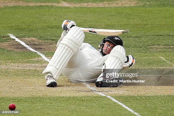 Tom Latham of New Zealand is hit on the helmet during day two of the Second Test match between New Zealand and Bangladesh at Hagley Oval on January...