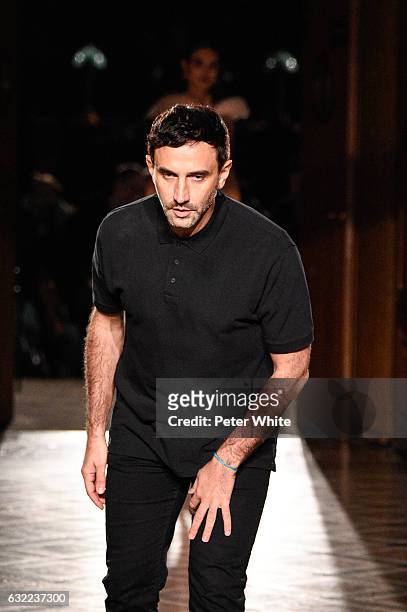 Designer Riccardo Tisci acknowledges the applause of the audience after the Givenchy Menswear Fall/Winter 2017-2018 show as part of Paris Fashion...
