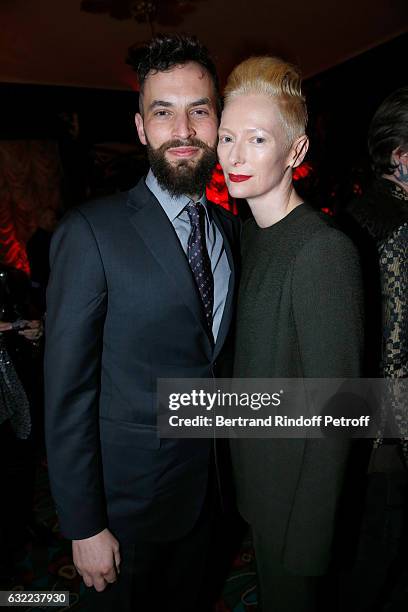 Tilda Swinton and her husband Sandro Kopp attend the Berluti Dinner as part of Paris Fashion Week - Menswear F/W 2017-2018. Held at Maxim's on...