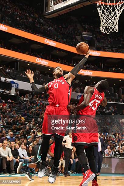 Jared Sullinger of the Toronto Raptors grabs the rebound against the Charlotte Hornets on January 20, 2017 at Spectrum Center in Charlotte, North...