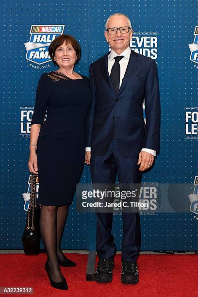 Hall of Fame inductee Mark Martin poses on the red carpet with his wife Arlene prior to the NASCAR Hall of Fame Class of 2017 Induction Ceremony at...